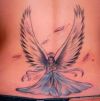 angel girl tats on girl's back