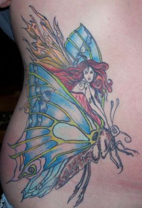 Fairy On Butterfly Tattoos