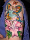 fairy on lily flower tattoo art