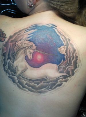Unicorn Tattoo On Girl's Back
