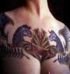 unicorn and rose tattoo on chest