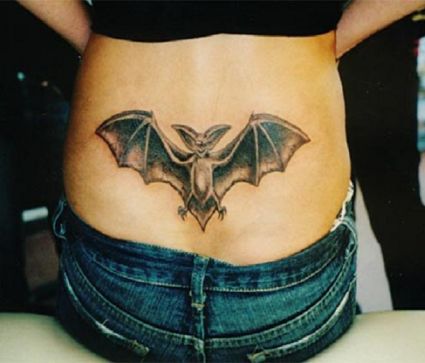 Flying Bat Tattoo On Girl's Back