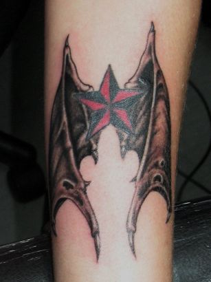Star And Bat Wing Tattoo