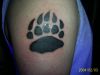 bear paw tattoo on arm