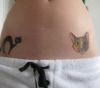 cat tattoo on lower stomach