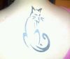 tribal cat back tattoo