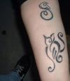 tribal cat arm tattoo pic