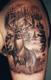 deer tattoo on left arm