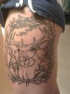 deer tattoo on thigh
