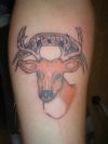 deer head leg tattoo