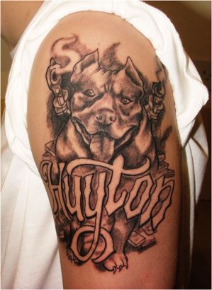 Dog Head Tattoo On Left Arm