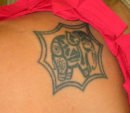 Elephant Tattoo On Girl's Shoulder