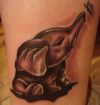 small elephant and butterfly tattoo