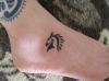 horse tattoo on ankle