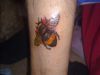 bee leg tattoo