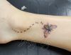 bee pic tattoo on ankle