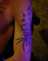 spider arm tattoo