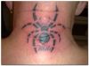 spider tattoo on neck