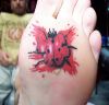 ladybug tattoo on paw