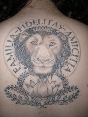 Lion Head And Lotus Tattoo