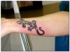lizard wrist tattoo