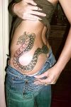 snake tat on hip