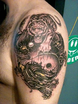 Tiger And Dragon Tattoo On Arm