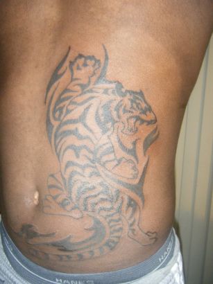 Tribal Tiger Tattoo On Stomach