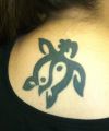 tribal turtle back of neck tattoo