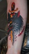 wolf and dagger tattoo
