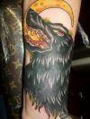 wolf pic of tattoo on leg