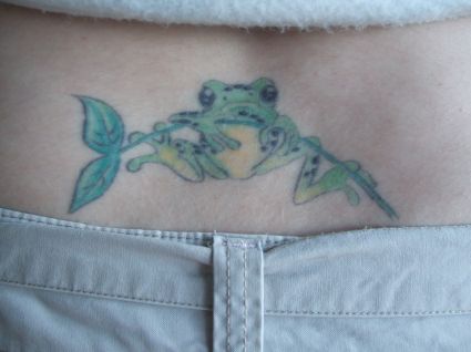 Frog With Leaf Tattoo On Lower Back