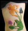 frog,butterfly and flower tattoo