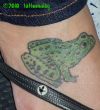frog picture tattoo on thigh