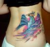 bird girl's back tattoo