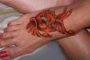 small bird feet tattoo