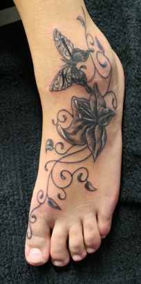 Butterfly And Flower Image Tattoo On Feet