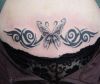 tribal butterfly picture tattoo on lower stomach