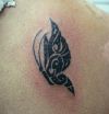 tribal butterfly picture tattoo on back