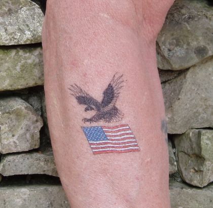 Flying Eagle And Flag Pic Tattoo