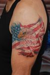 eagle and flag pic arm tattoo