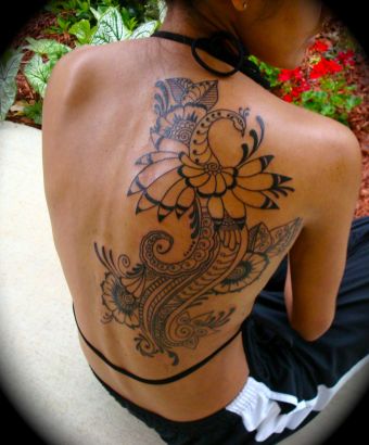 Peacock Tattoos Pics On Side Back Of Girl