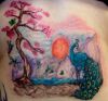 peacock and cherry blossom back tattoos