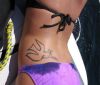 dove olive branch pic tattoo on upper hip