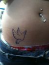 dove tats design on lower stomach