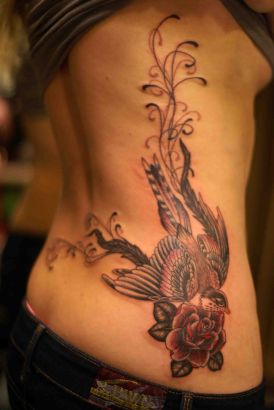 Bird And Rose Pic Tattoo On Rib