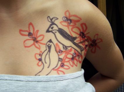 Bird Pic Tattoo On Chest