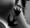 birds tattoo on neck