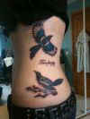 birds pic tattoo on side rib