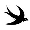 fly black bird tattoo